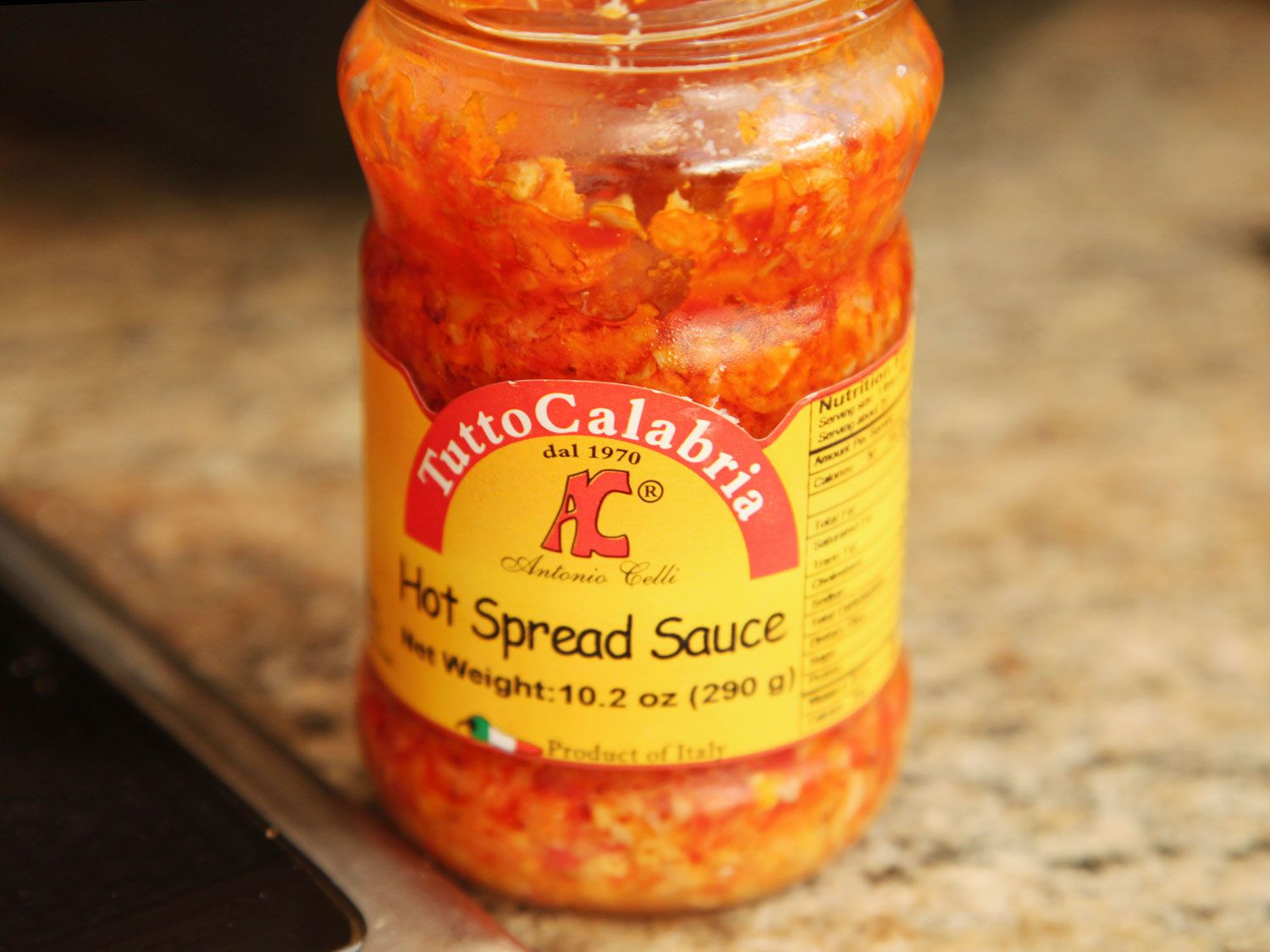 Close-up of a jar of Tutto Calabria Hot Spread Sauce (Calabrian chili condiment)