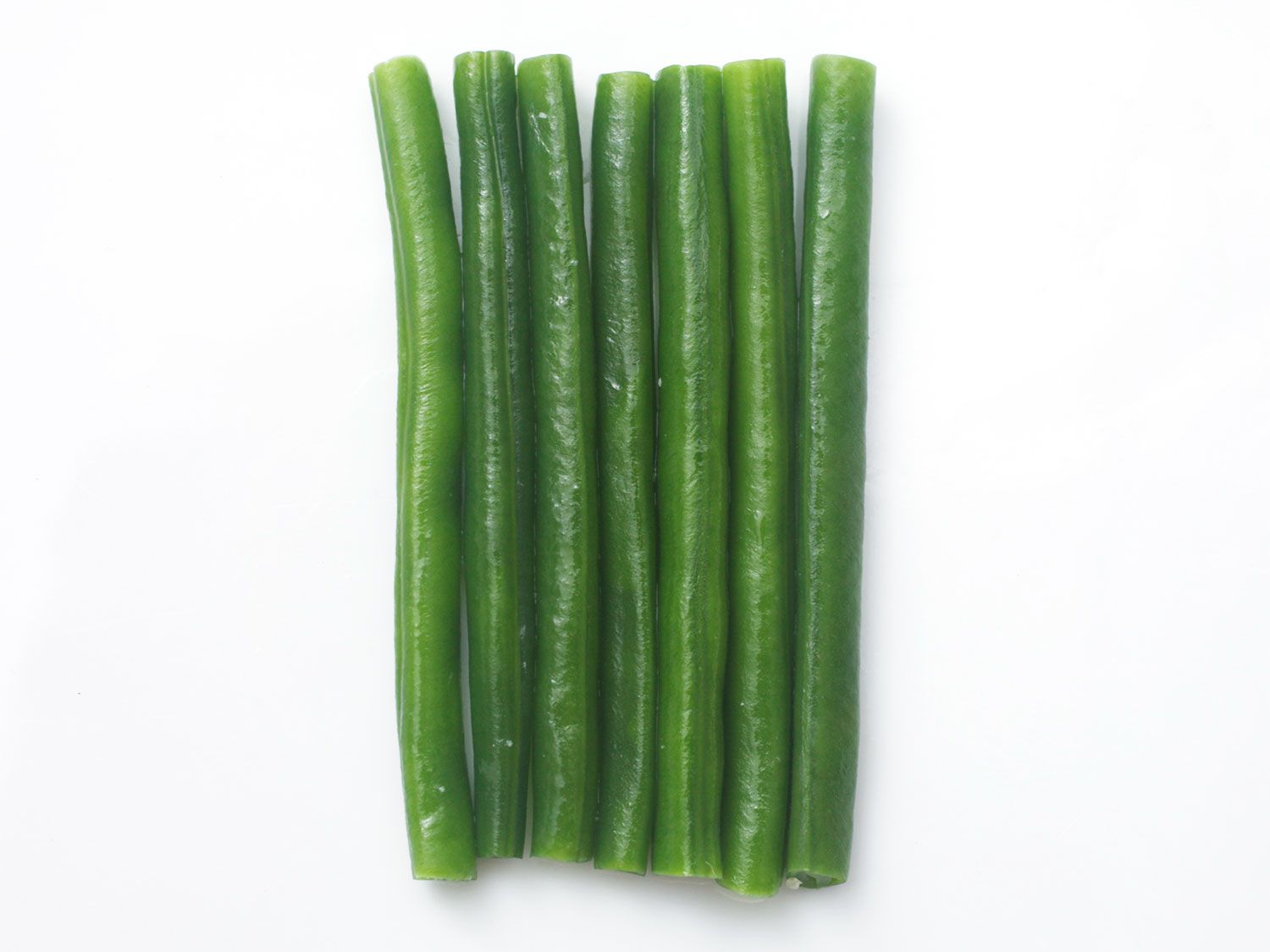 A group of trimmed green beans, looking lightly cooked though in reality they have been cryo-blanched in a freezer.
