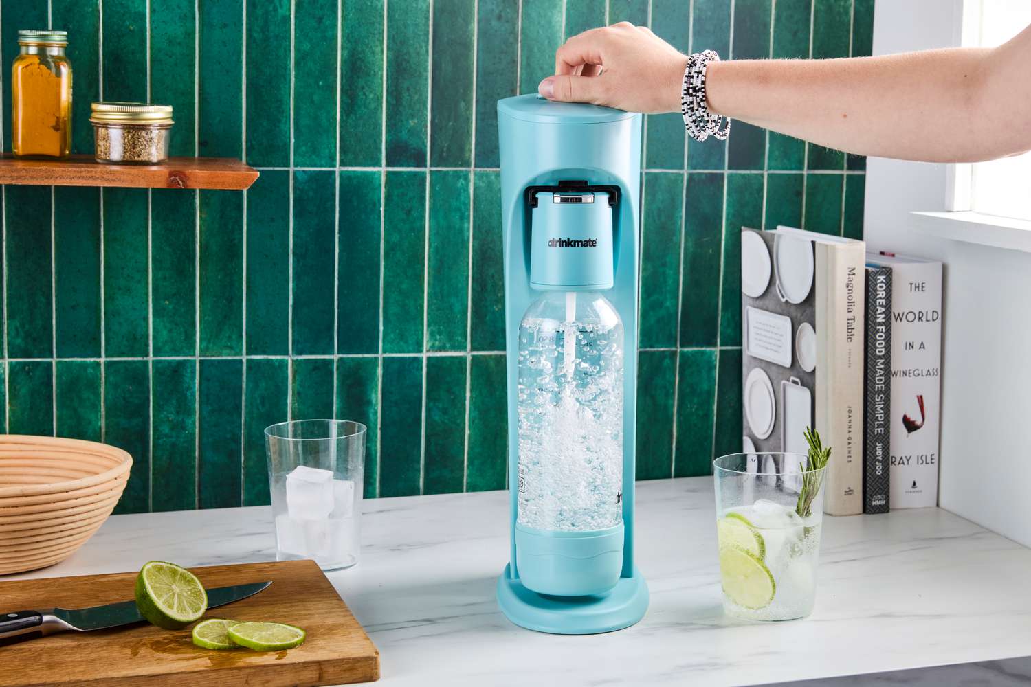 Water being carbonated with the Drinkmate soda maker.