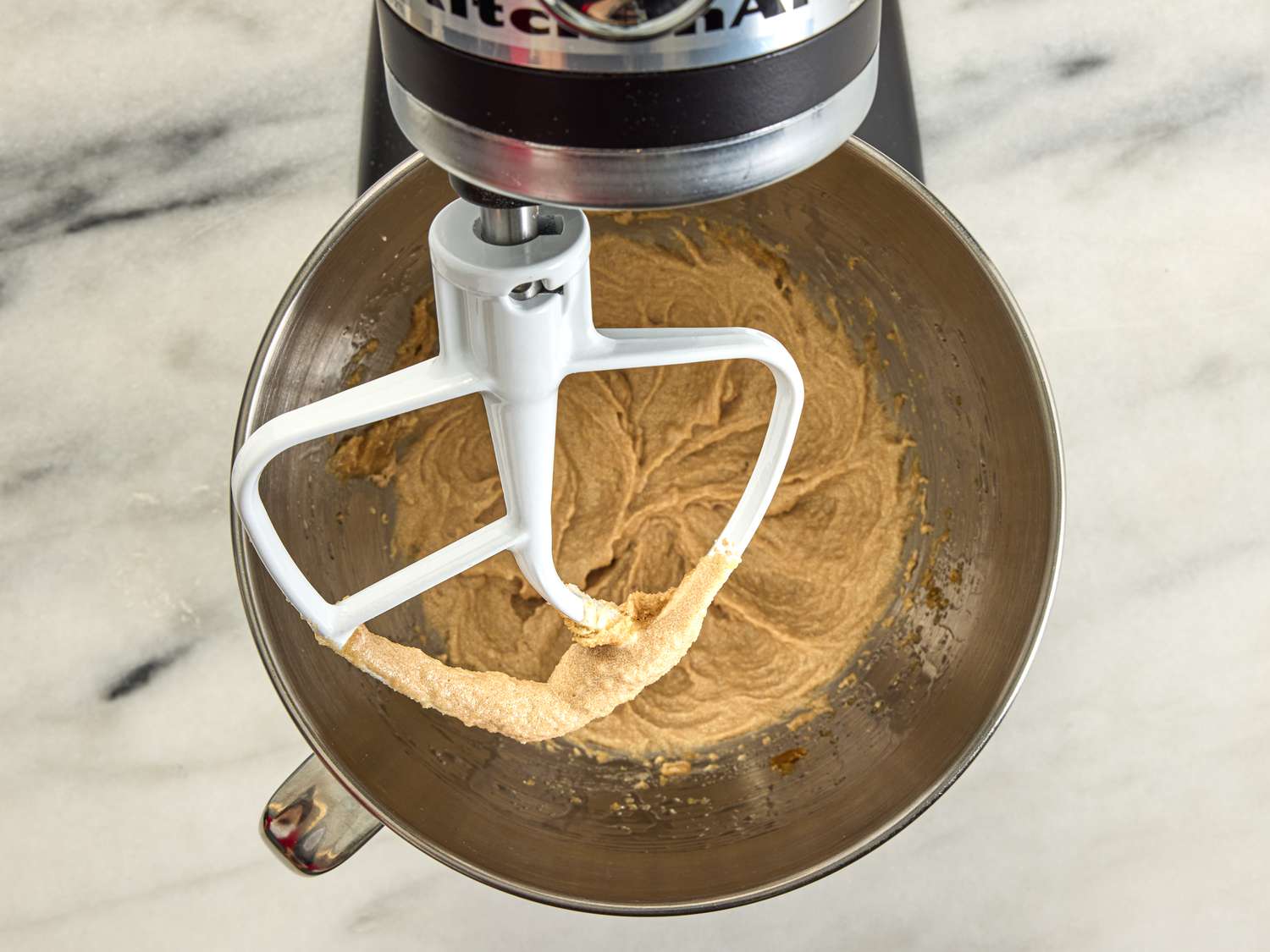 beating sugar, butter, oil in stand mixer 