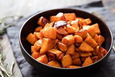 a bowl of roasted sweet potato chunks