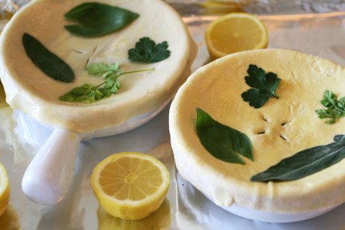 Coquilles St. Jacques pot pies on a baking sheet ready for baking