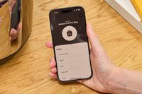 A person controls the Instant Pot Pro Plus Wi-Fi Smart 10-in-1 6-Quart Pressure Cooker with their smartphone