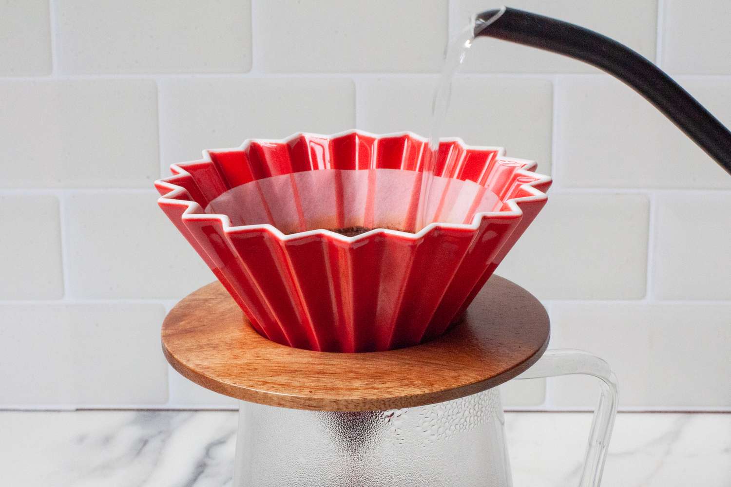 Water being poured into the Origami dripper