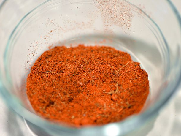 A bowl containing seasoning for sweet potato wedges. 