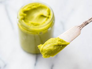 A jar of homemade pistachio paste. 