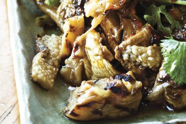 close up of roasted eggplant and leek salad