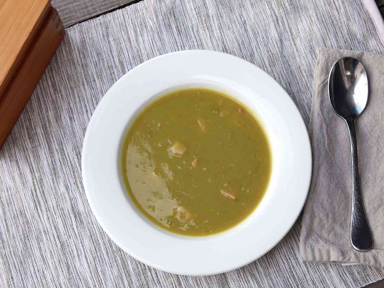 Split pea soup in a white bowl 