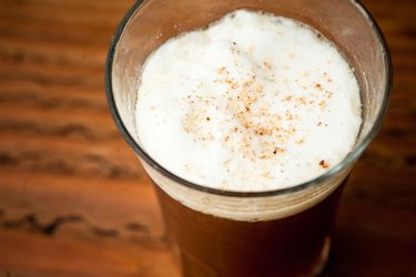 Closeup of a Buena Vista fizz, seved in a tall glass.