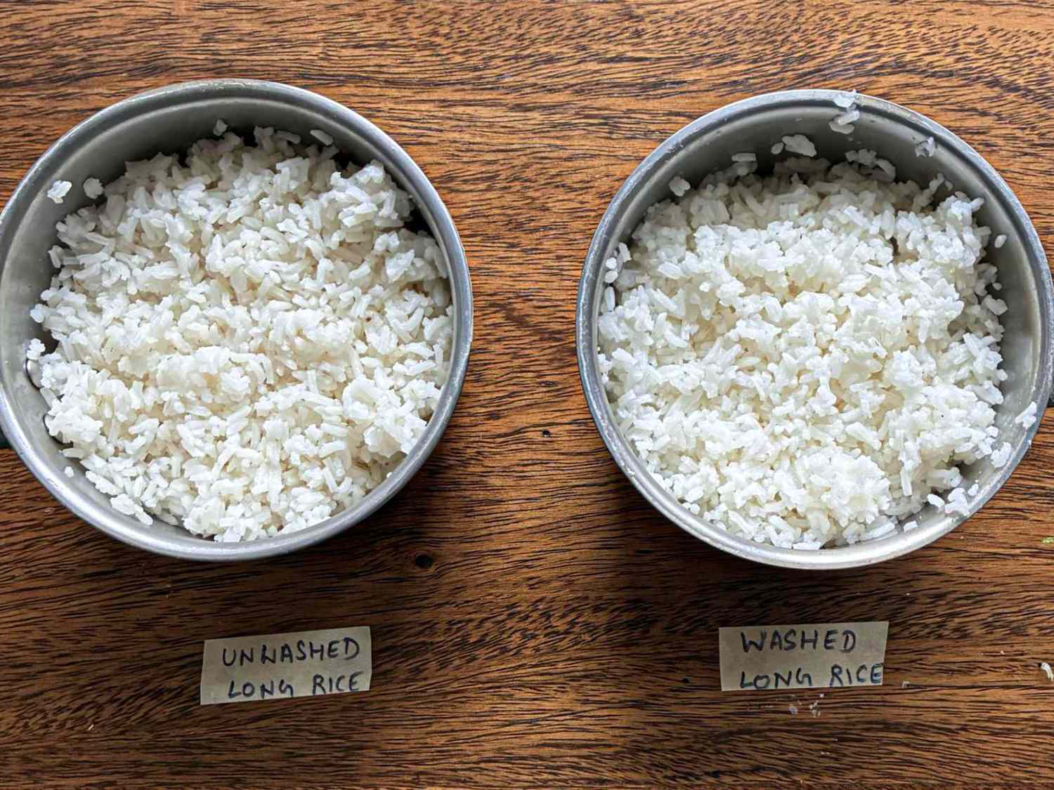 Two bowls of long rice labeled as unwashed and washed