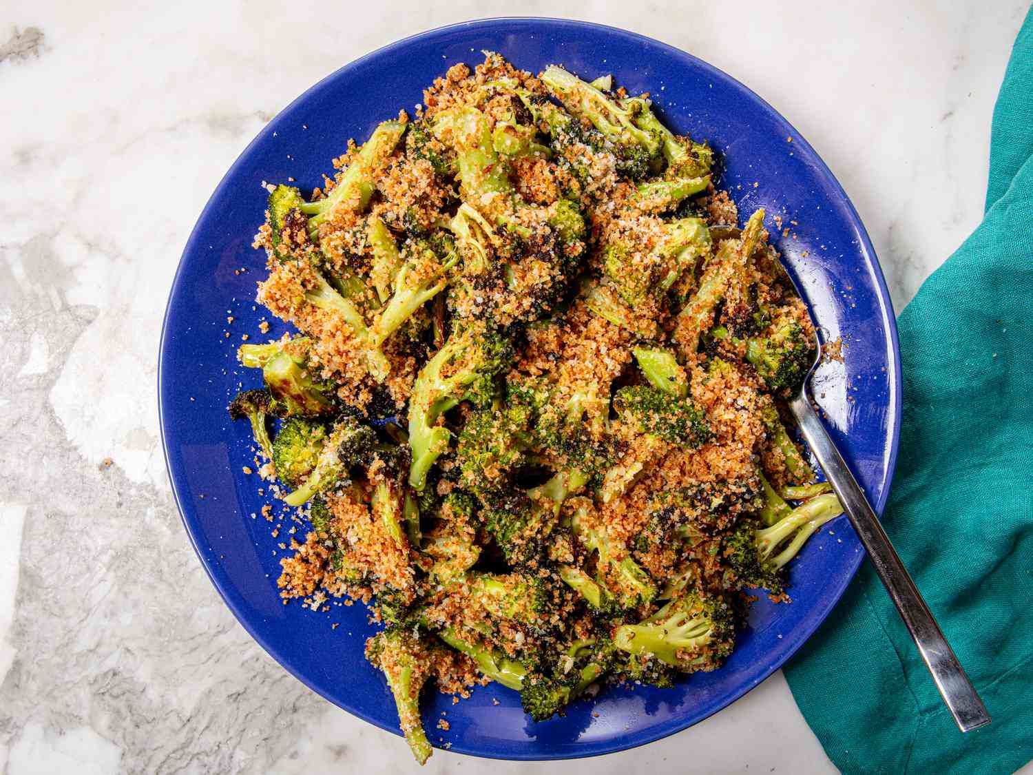 Overhead view of air-fryer broccoli with caesar bread crumbs