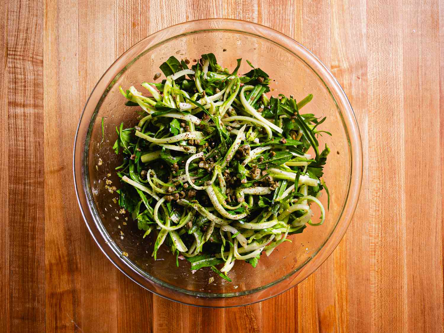 Puntarelle topped with dressing and capers