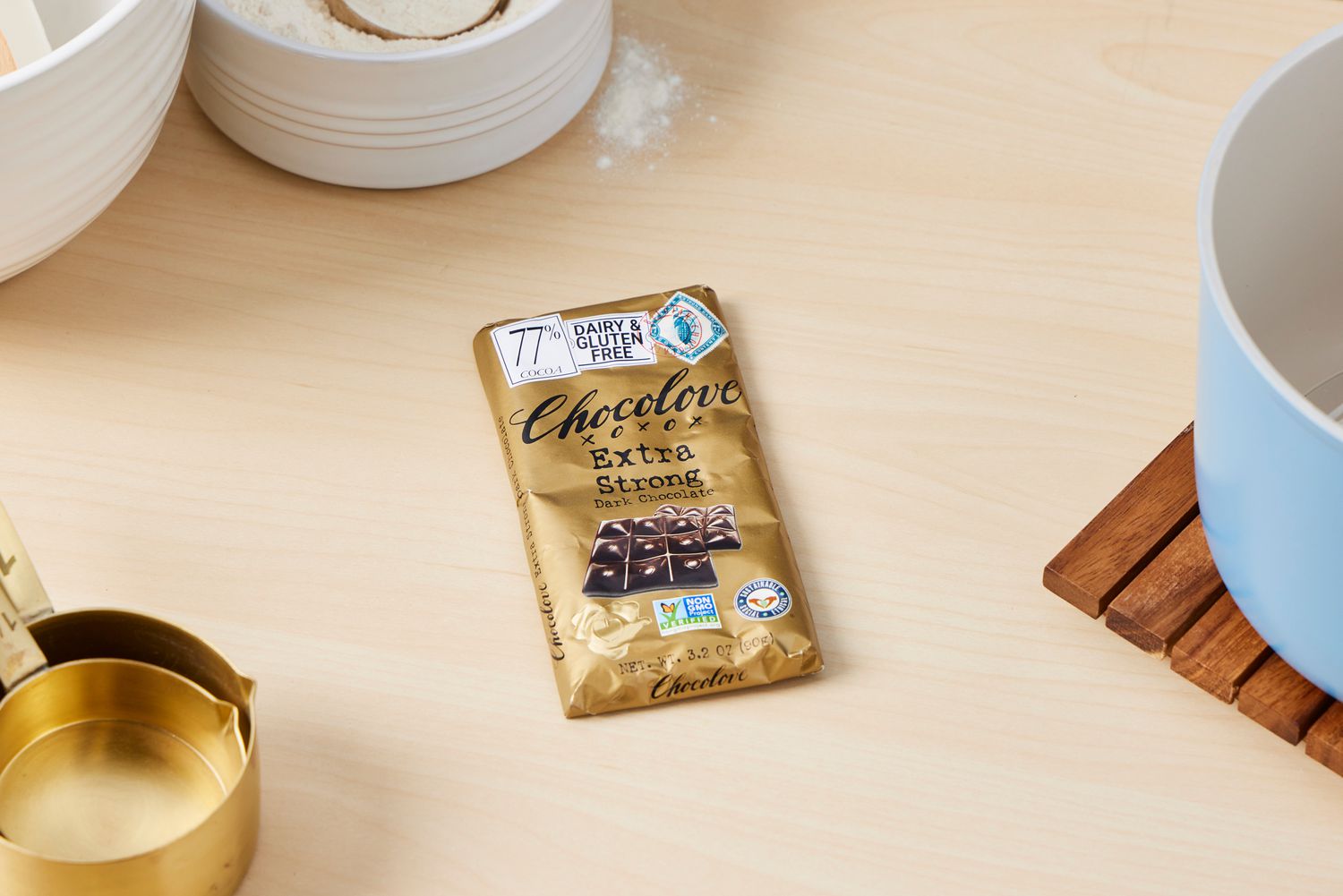 A chocolate bar with a gold wrapper.