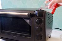 filling the water tank in the tovala oven