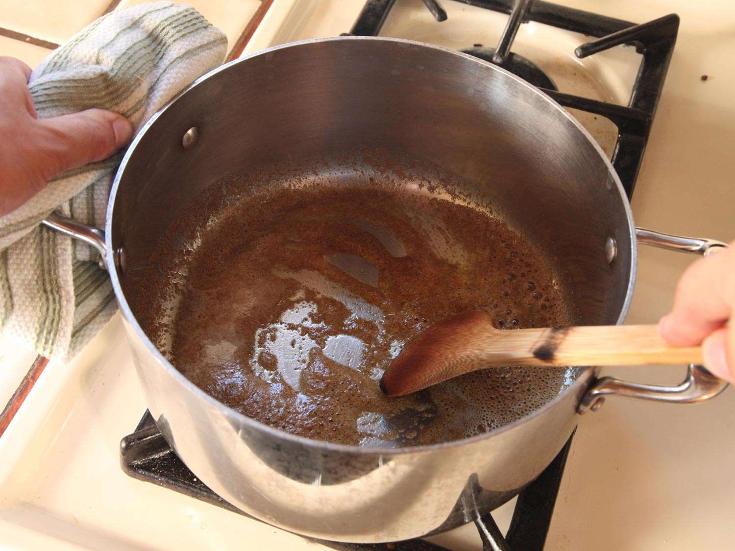 Blooming ground cumin and coriander in hot oil.