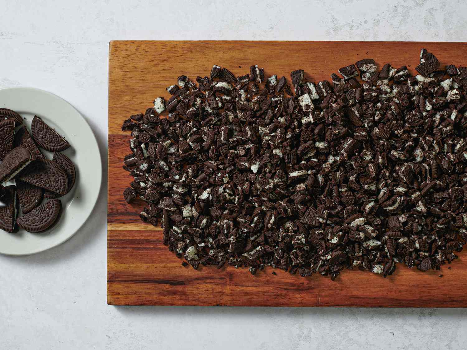 Oreos chopped on a cutting board