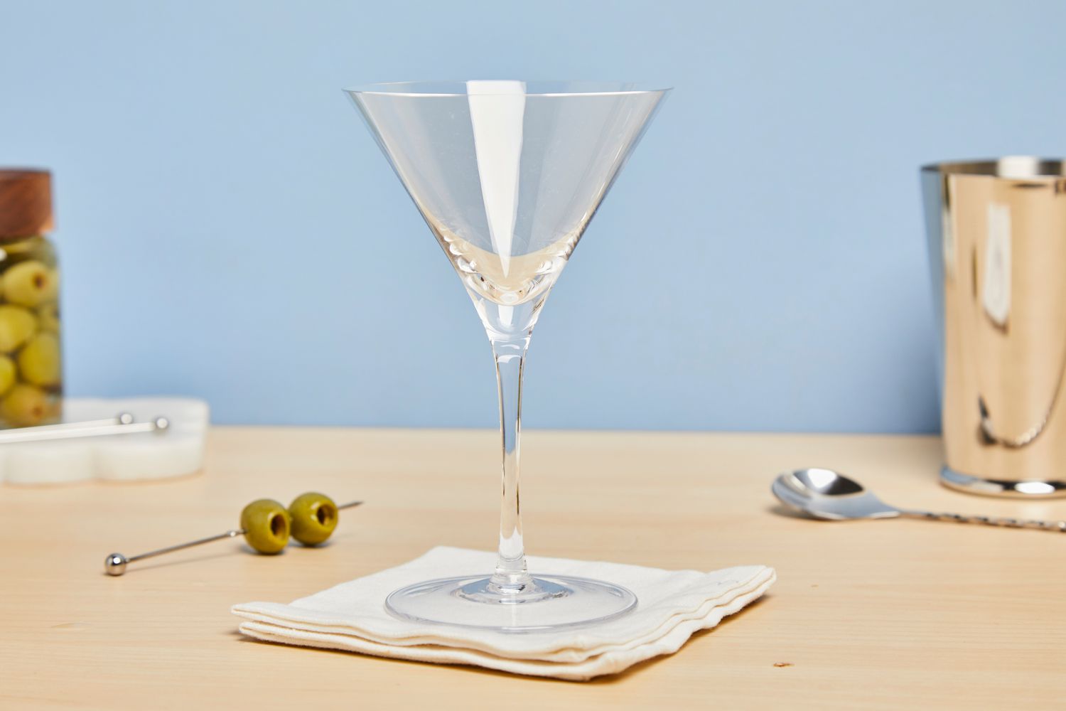 Williams Sonoma Reserve Martini Glasses empty sitting on a napkin