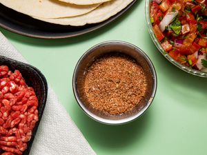 Overhead view of homemade taco seasoning in a small bowl