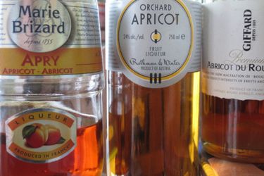 An assortment of bottles of apricot brandy