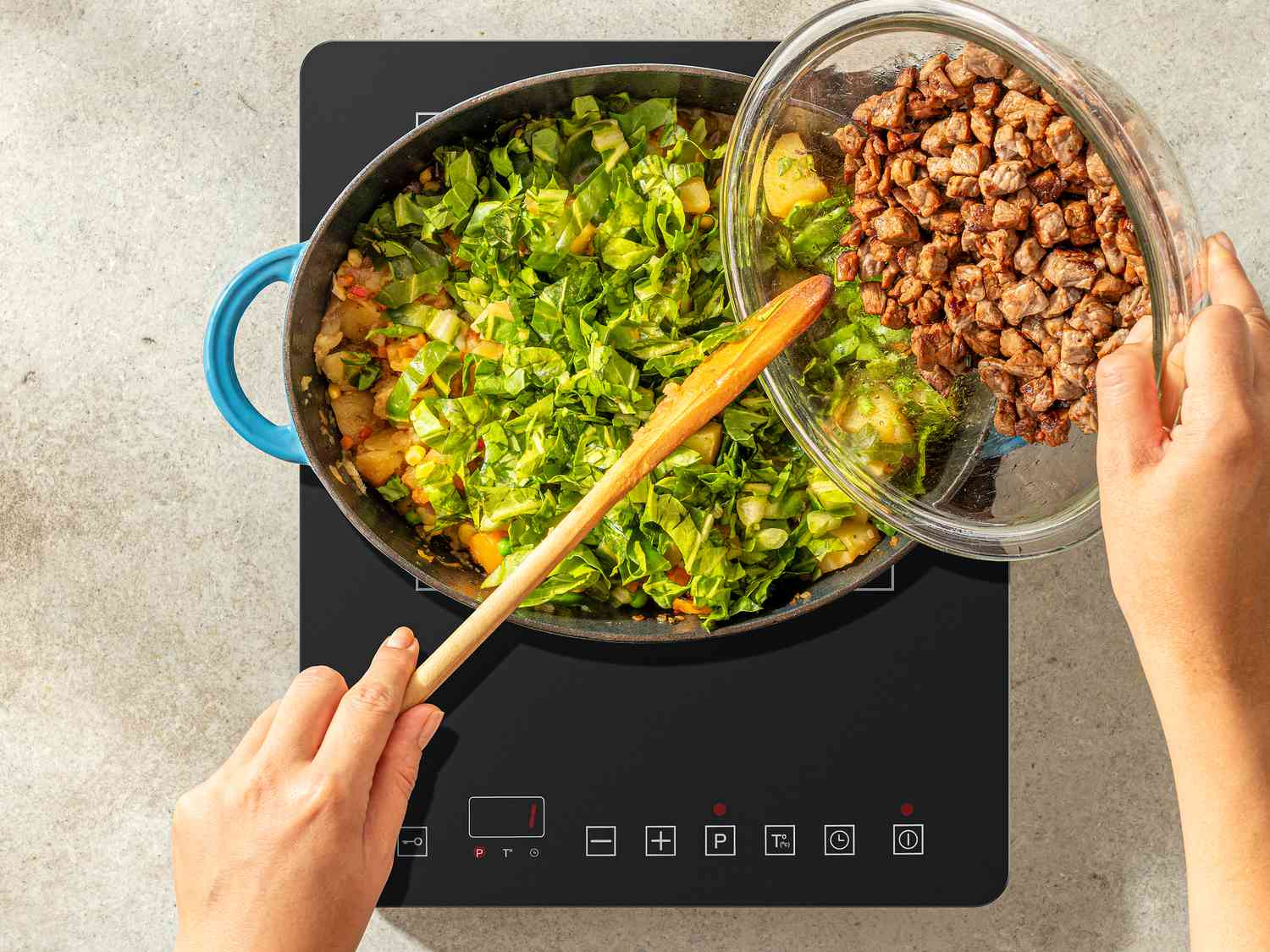 Overhead view of adding beef back in