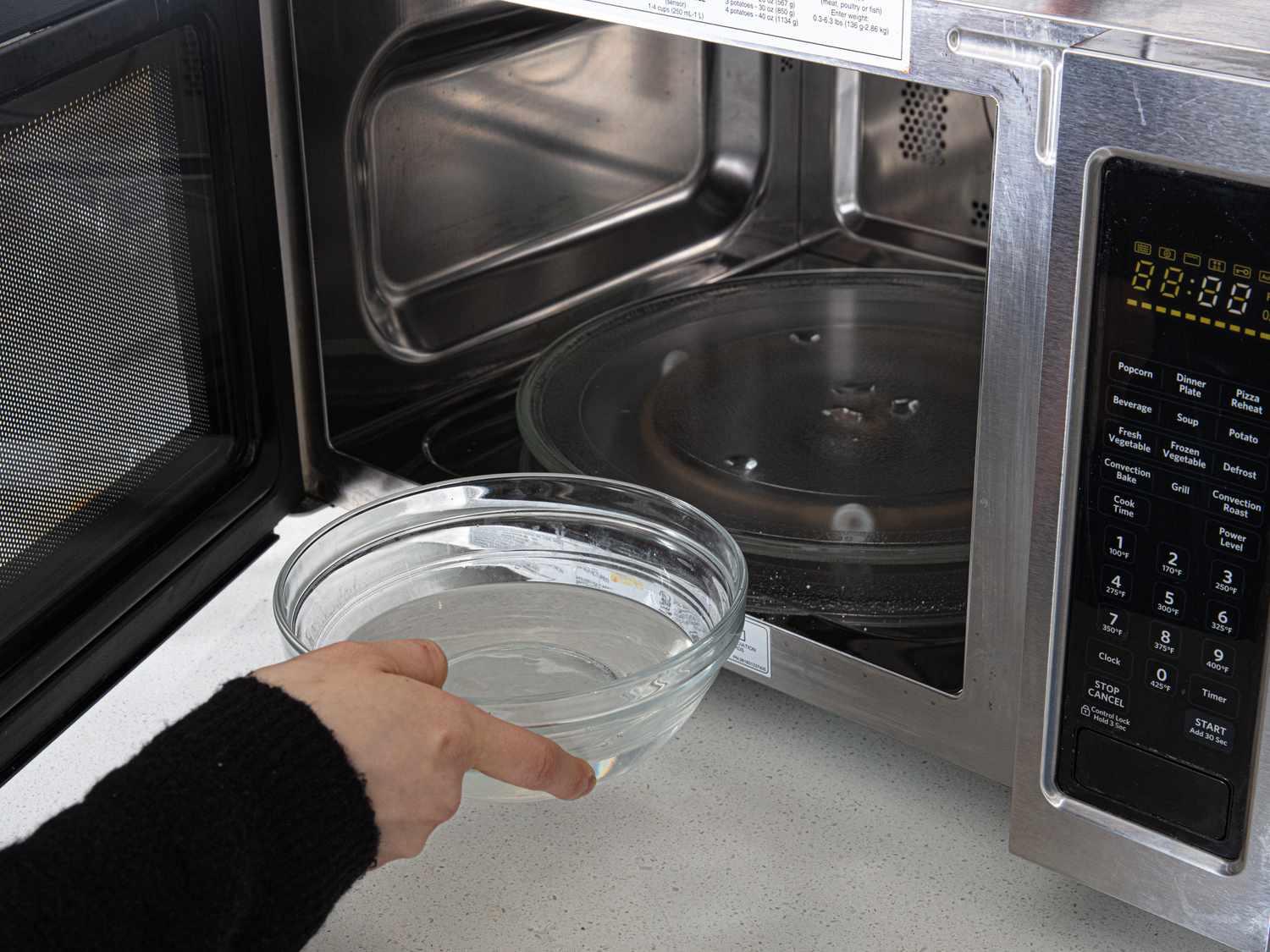 Placing water into microwave
