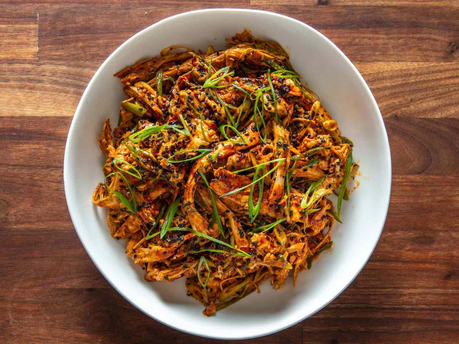 Closeup overhead of a bowl of Sichuan-style turkey salad.
