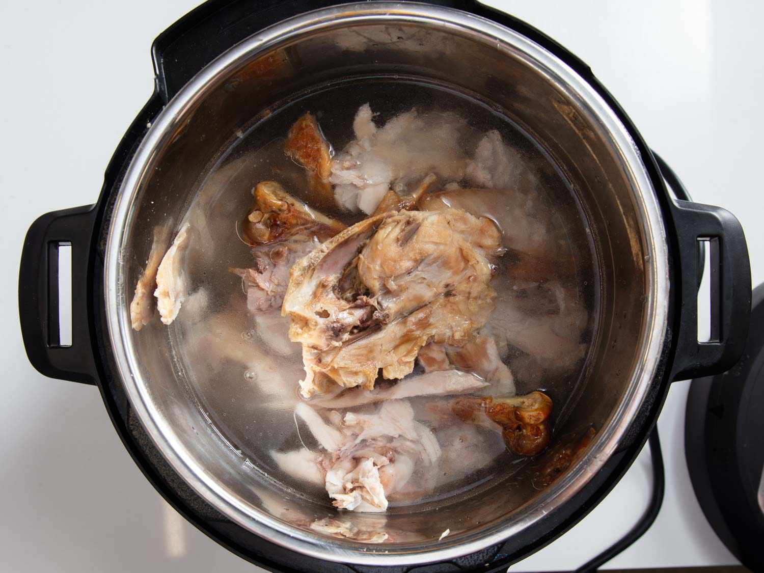 Turkey bones in a pressure cooker.