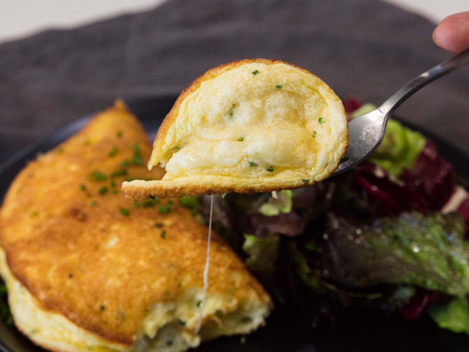 a forkful of omelette soufflé