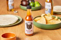Flavor and Fire Foods Taco Cat Sauce on coounter