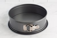 The NordicWare springform pan on a marble countertop.