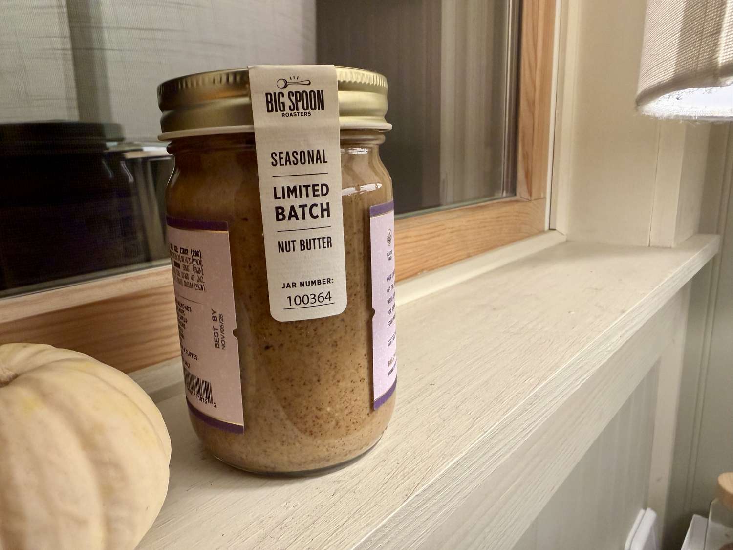 A jar of Big Spoon Roasters on a windowsill