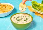Dipping a chip in the caesar dip