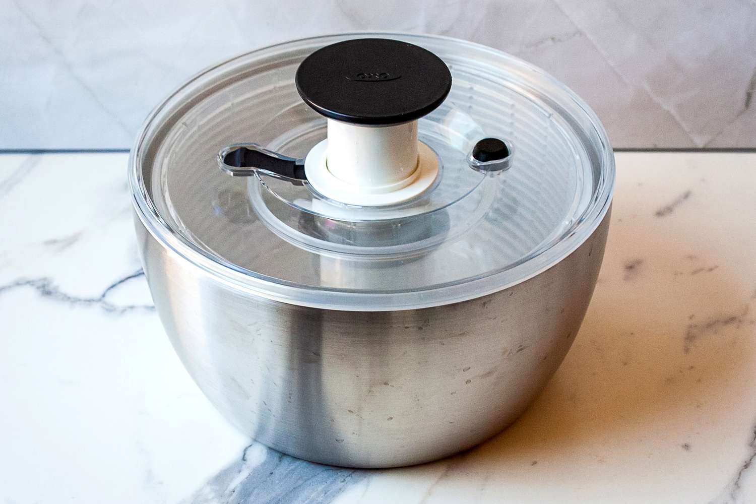 the OXO steel salad spinner