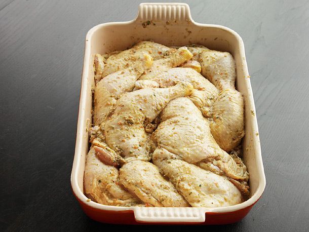 chicken marinating in dish