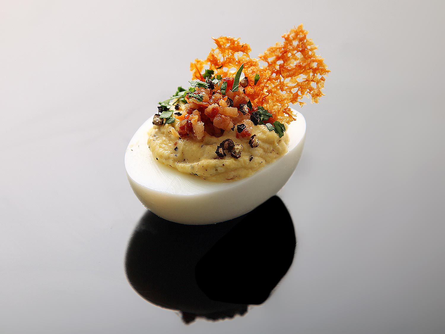 Deviled Eggs Carbonara (With Crispy Pancetta, Pork Fat, Parmesan Crisps, and Black Pepper)