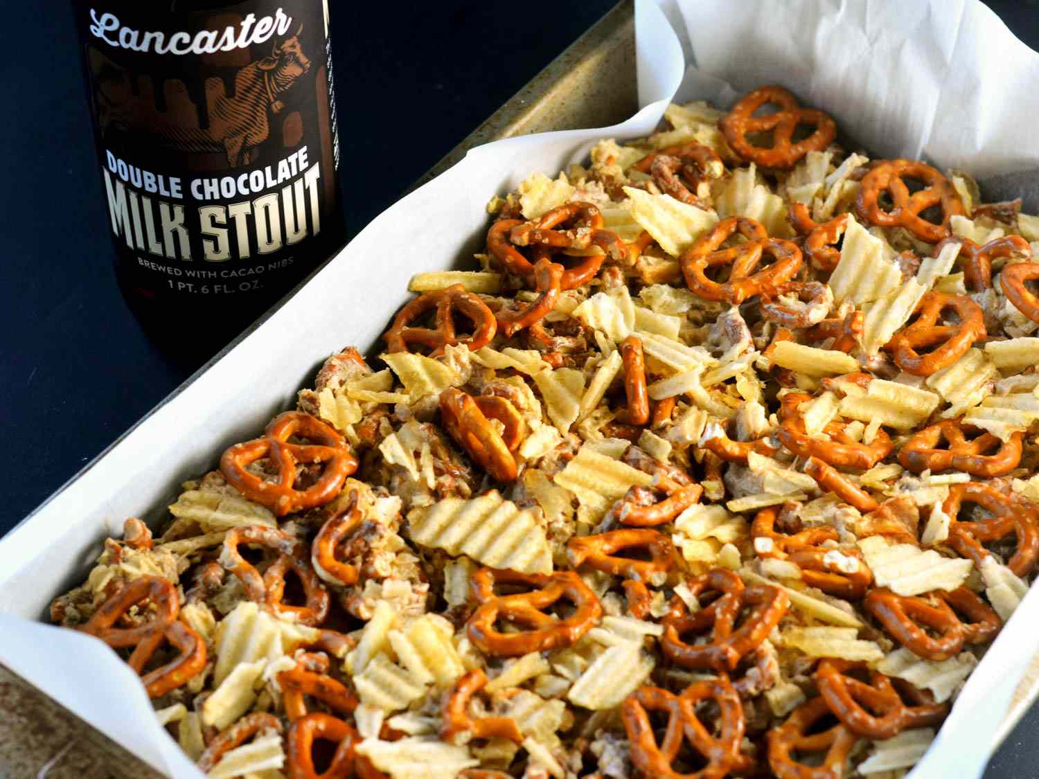 The finished mixture has been pressed into a baking pan, ready to be sliced into bars.