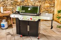 The Weber Genesis E-335 on a patio