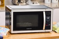 Marshmallows in a bowl heating in the Farberware Countertop Compact Microwave (FMWO11AHTBKB) 