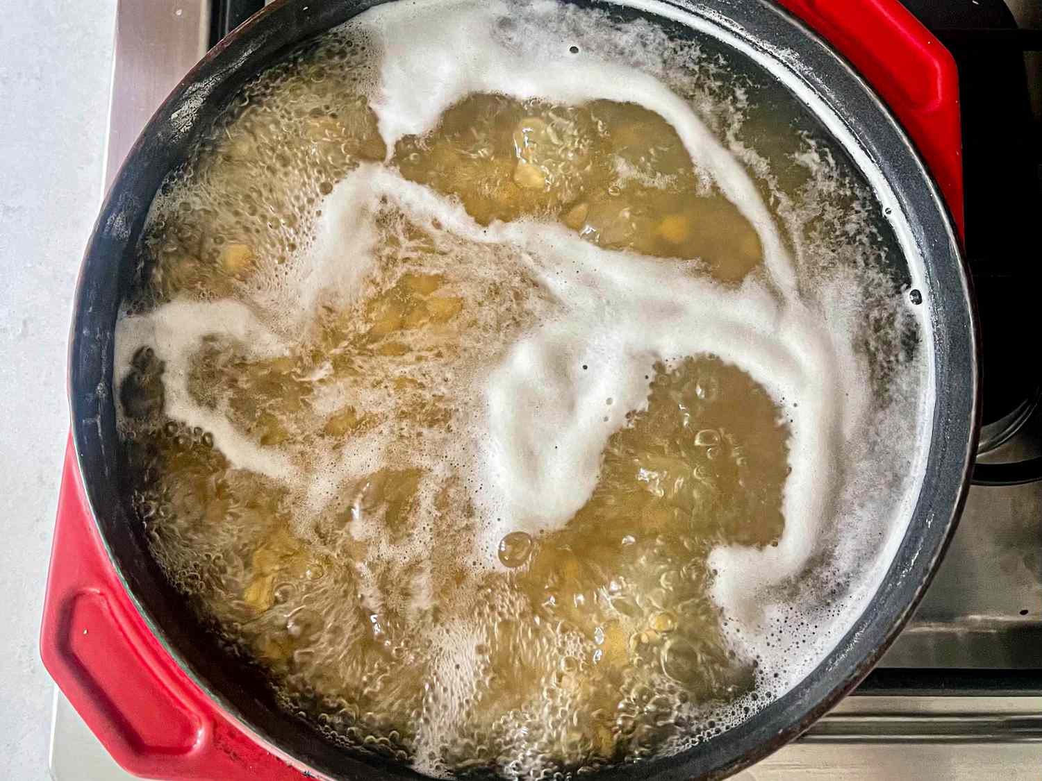 Overhead view of chickpeas cooking