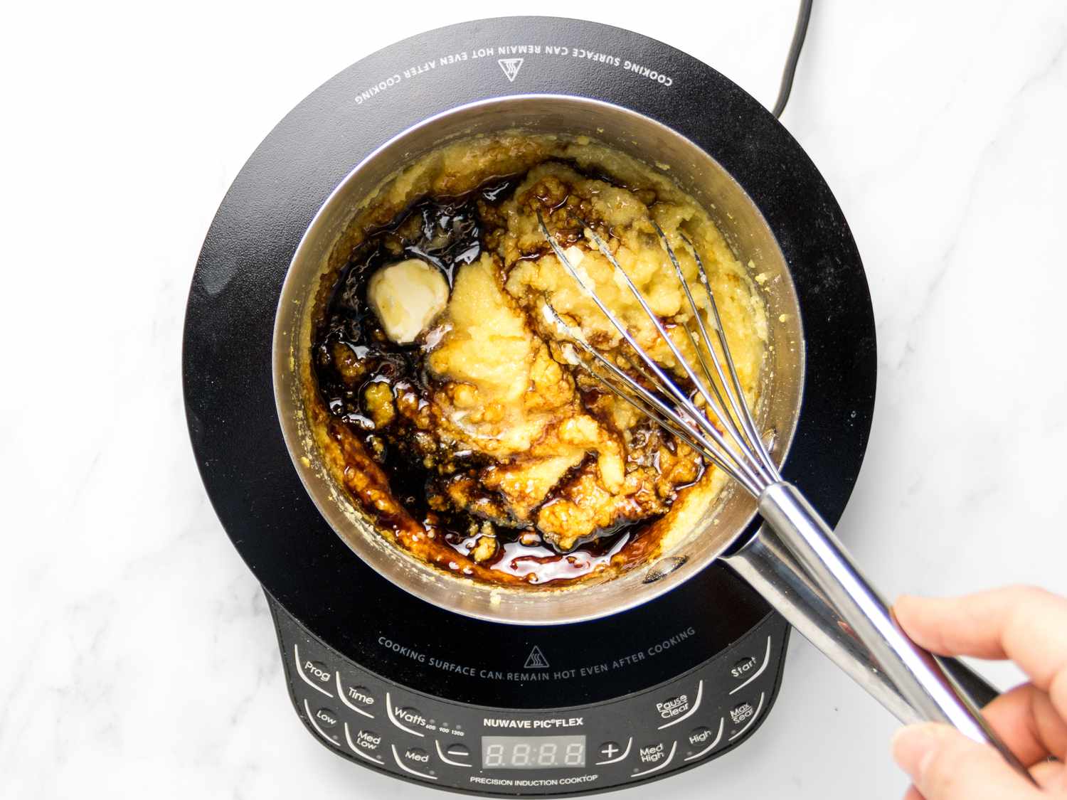 Adding in molasses and butter to saucepan