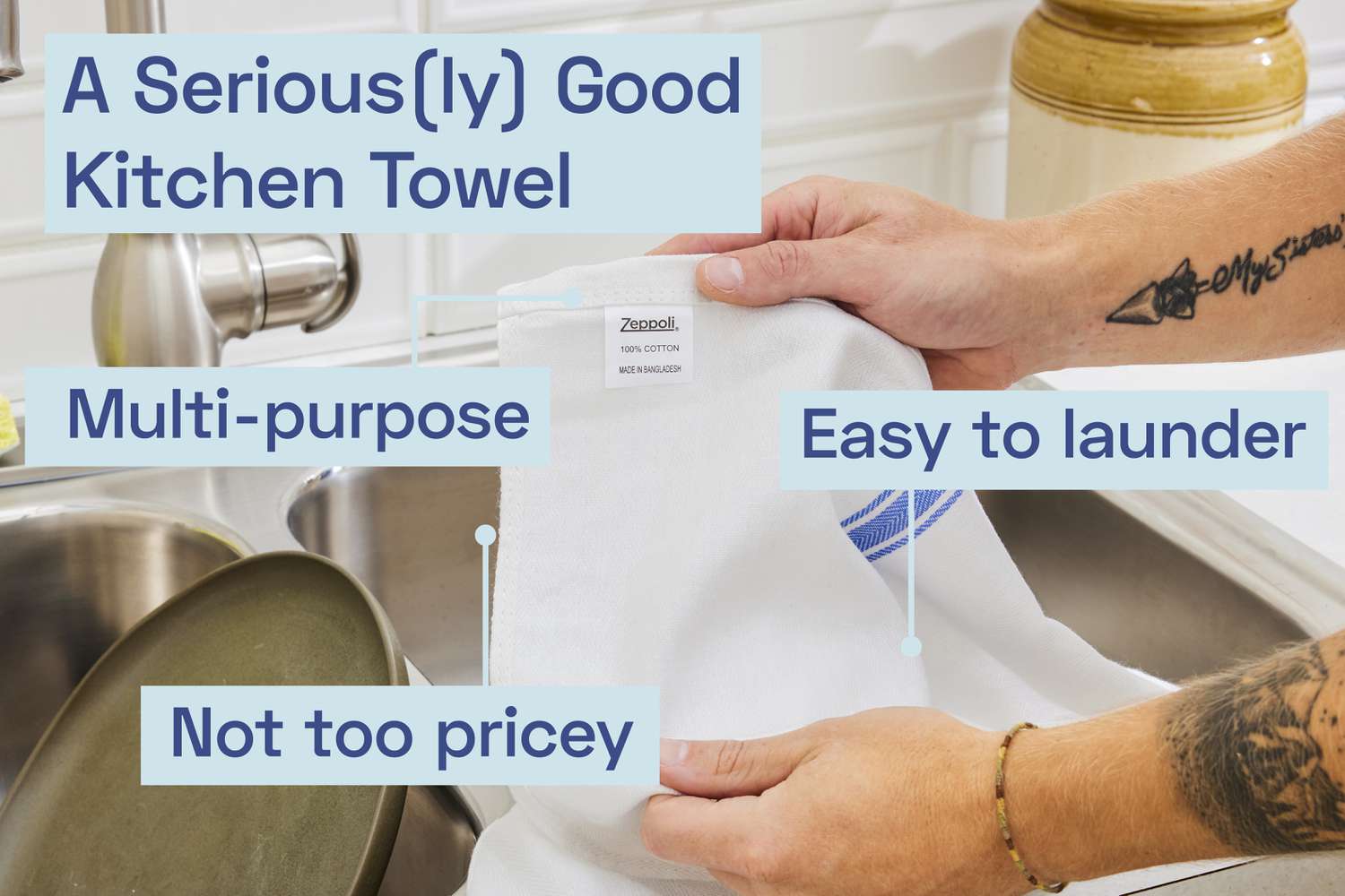 A person holding a kitchen towel.