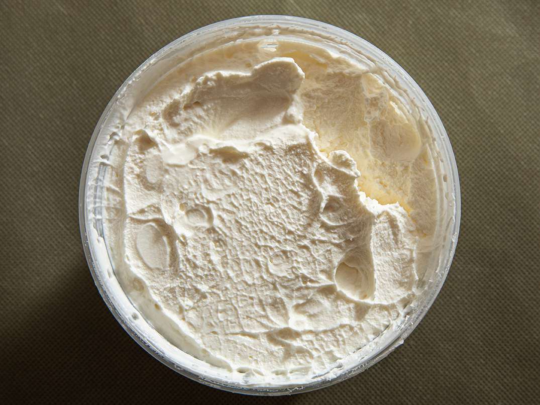Labneh in a plastic container