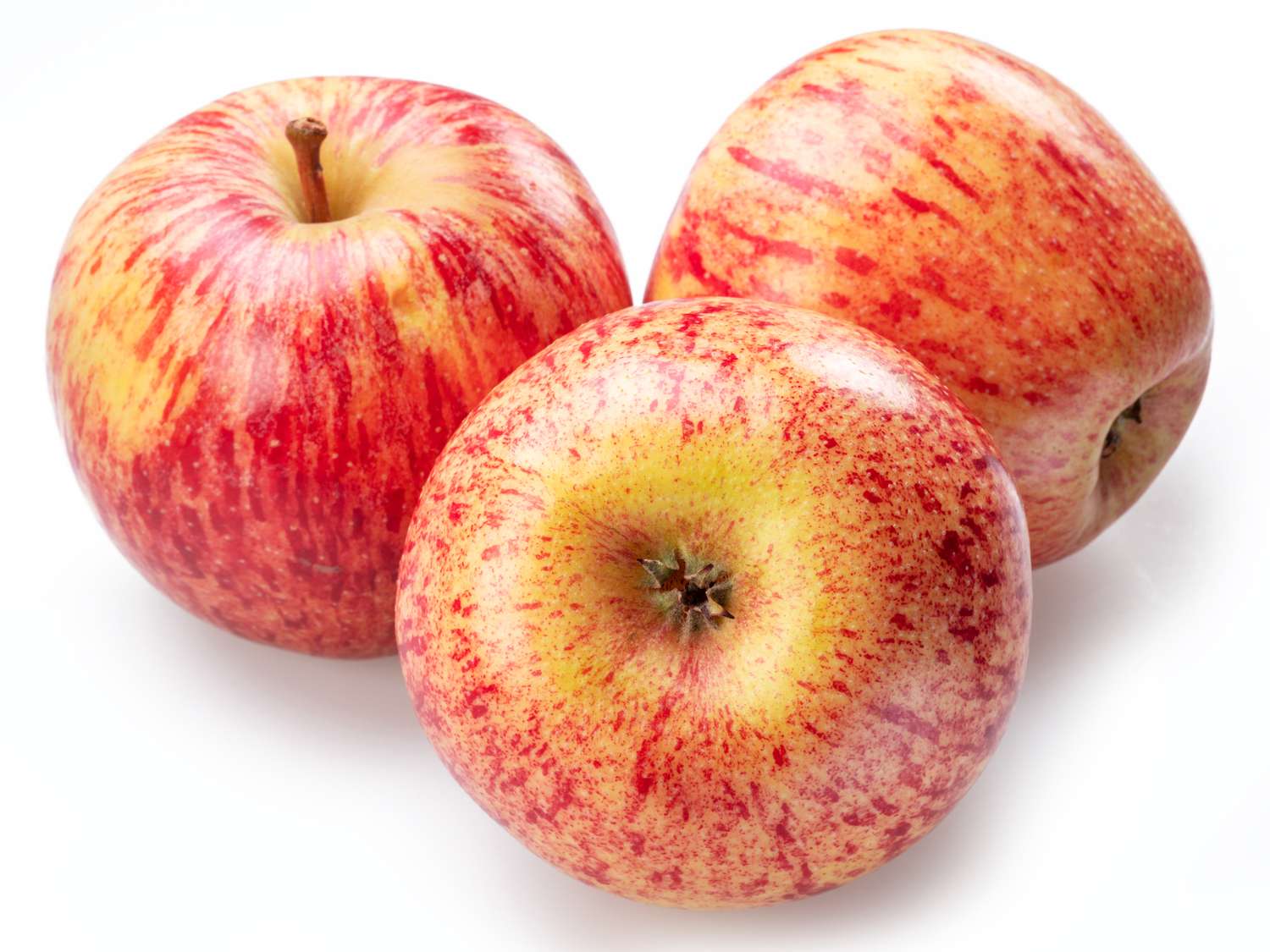 Three apples arranged closely together