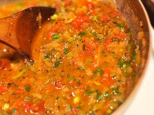 Close up view of Creole sauce in a saucepan. 