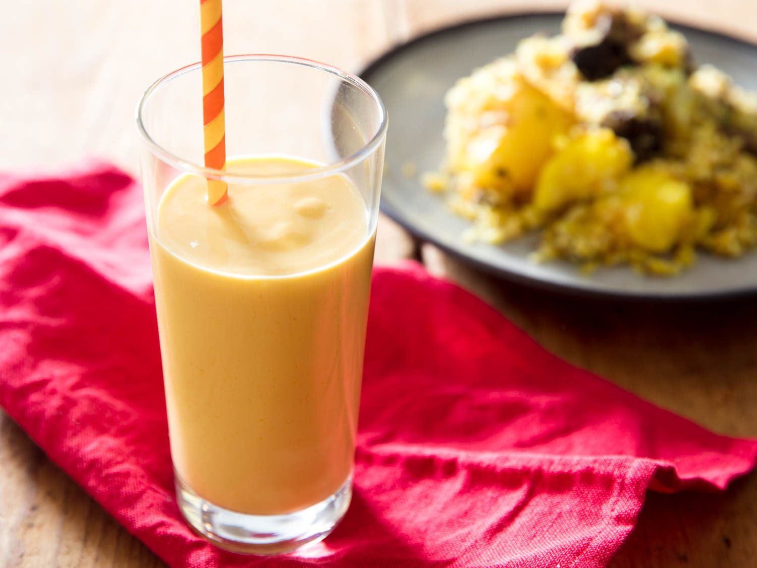 A glass of mango lassi. 