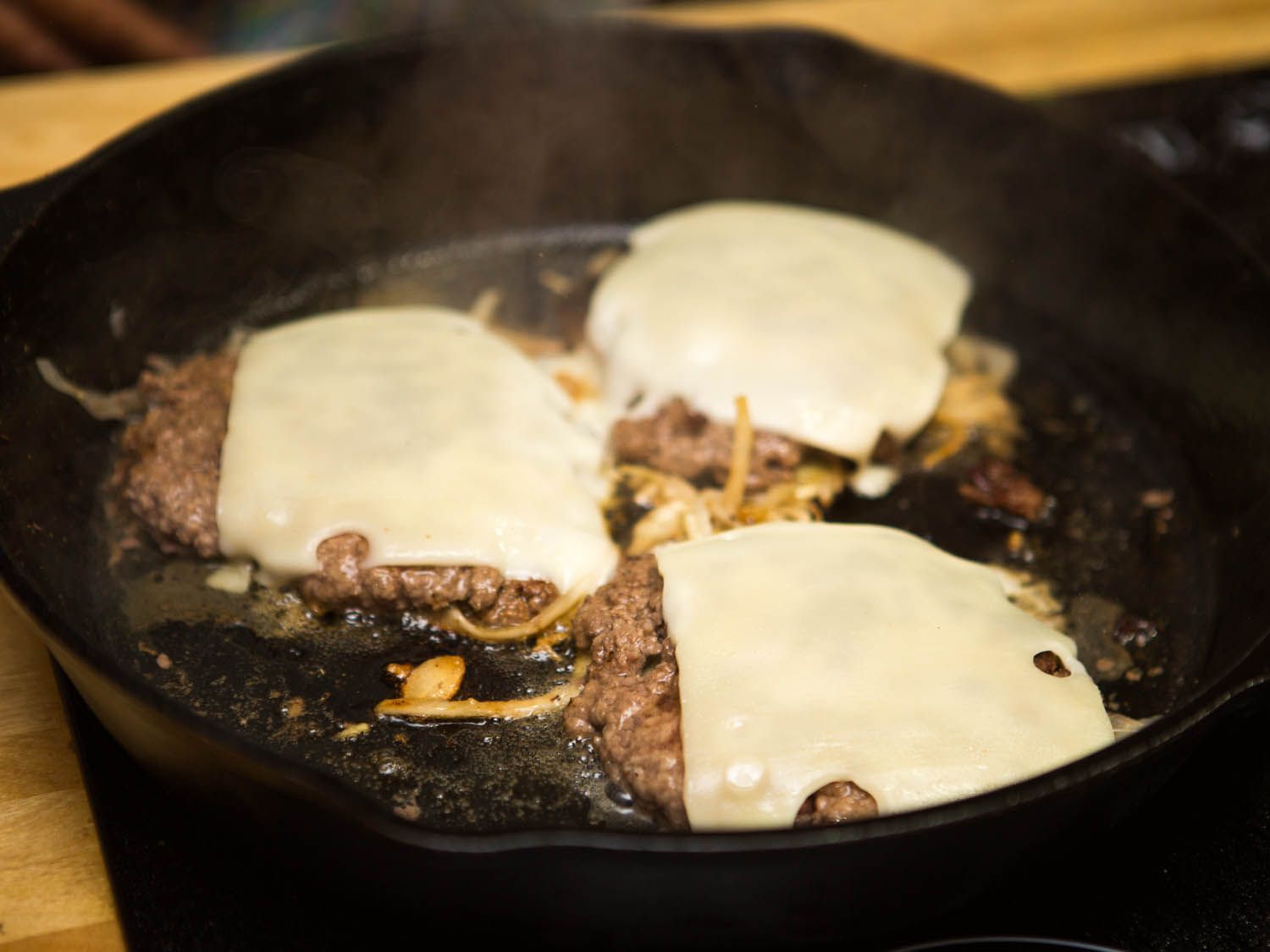 reuben burger with Swiss cheese