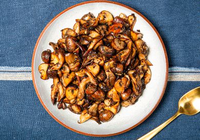 Overhead view of a plate of sauteed mushrooms