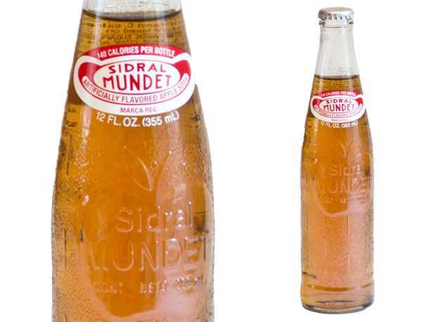 Closeup of a bottle of Sidral Mundet soda.