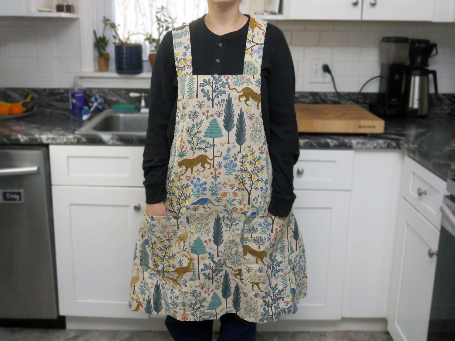 a person wearing the hedley and bennet smock apron