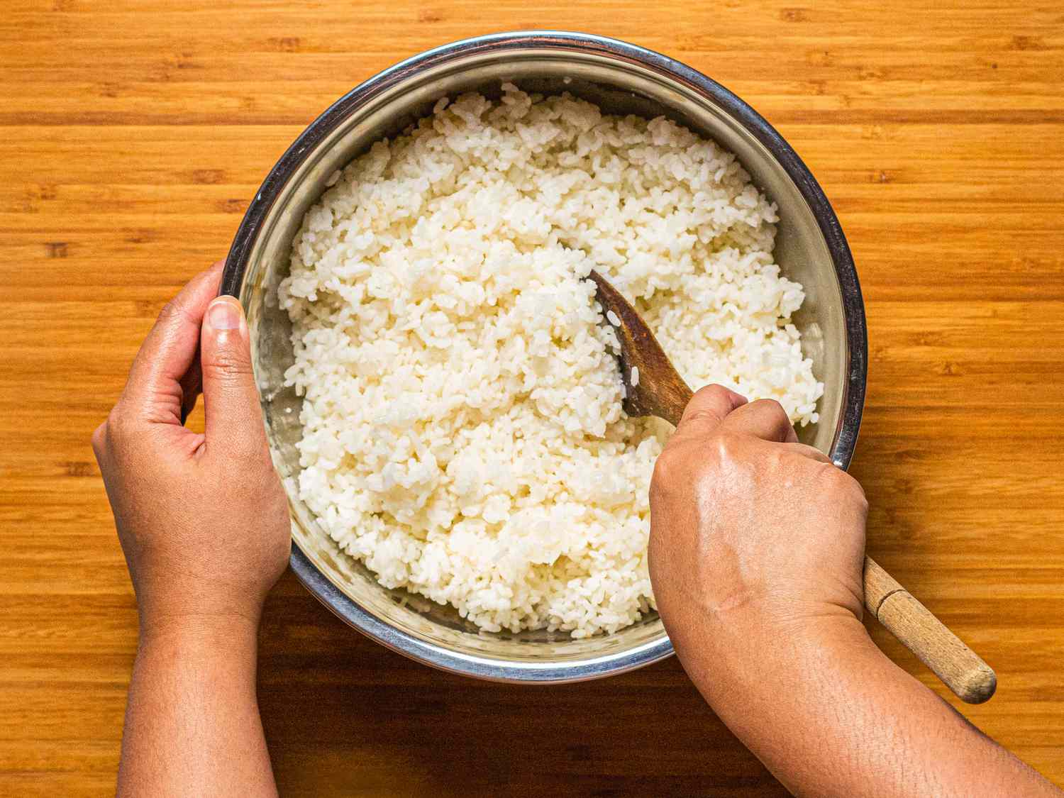 Overhead view of fluffy rice in bowl